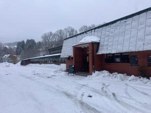 Apartmány ve sportovní hale