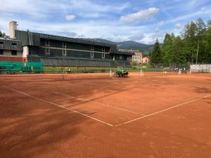 Apartmány ve sportovní hale
