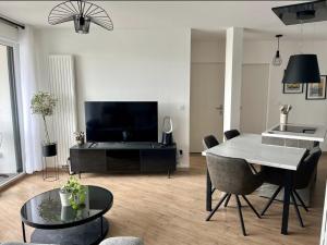 Appartement moderne et spacieux 2 chambres, parking privé