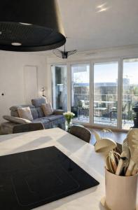 Appartement moderne et spacieux 2 chambres, parking privé