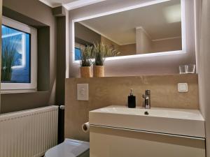 Haus Im Arnikagrund - Ferienwohnung & Privatzimmer