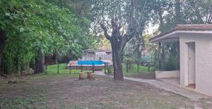 Casa con pileta y jardín - 3 dormitorios