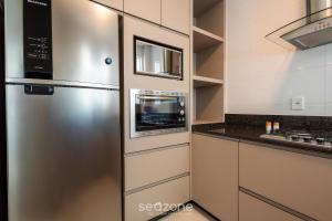 Apto c varanda gourmet a 450m da praia REB0802