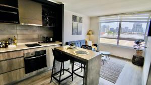 Moderno depto frente a metro Ñuble