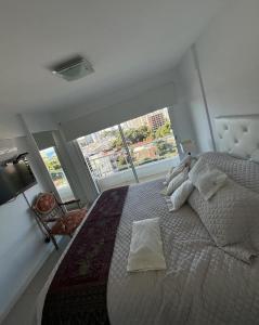 Piso 7 con vista a Playa Brava, Piscina y sauna