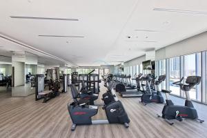 Vogue Vacation Homes, Creek Harbour, Harbour Views Tower Waterfront Living Close to Downtown, Burj Khalifa and Dubai Mall, One Bedroom Apartment with Balcony and Canal View, Access toAmenities