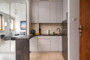 Piaskowa Comfort Apartment by BookingHost