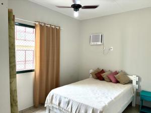 Apartamento com vista e piscinas em Caraguatatuba Praia de Massaguaçu