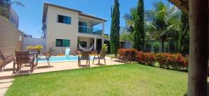 Casa acolhedora com acesso exclusivo ao Mar e Rio