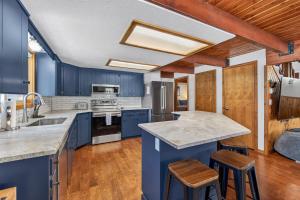 Mountains are Calling- Downtown oasis with game Room, hot tub, and trailer parking