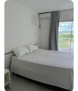 Flat com vista do lago e piscina aquecida