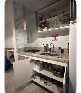 Flat com vista do lago e piscina aquecida