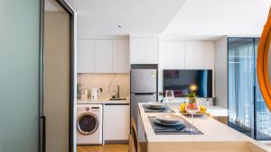 Beachfront Apartment 50 meter from Bangtao Layan