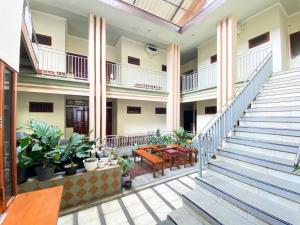 Rimbaku Homestay Syariah near Alun Alun Batu RedPartner