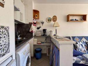 Appartement 2 pièces cabine dans résidence avec piscine 4 couchages AR070-D209