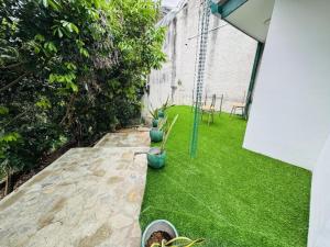 Charming 3-Bedroom Apartment with Garden in Kandy