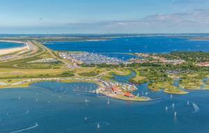 Beach Front Ship In Ouddorp With House Sea View