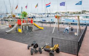 Beach Front Ship In Ouddorp With House Sea View