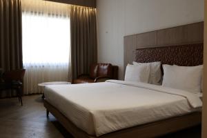 Get Inn - Hotel, VIP Road, Vesu