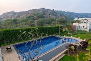 Prassanam Vatika 2-BHK Hillside Villa with Private Pool & Expansive 1-Acre Garden
