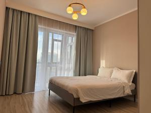 Cozy furnished Brand-New City Center UB Apartment