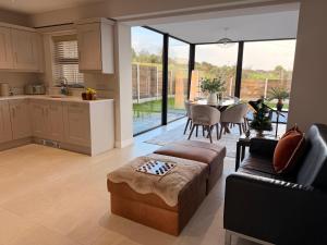 Modern Entire Home steps from the Train Station