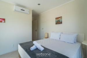 Condomínio à Beira-mar com Piscina em Morro das Pedras - PROs