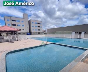 Quarto em condomínio com piscina e academia