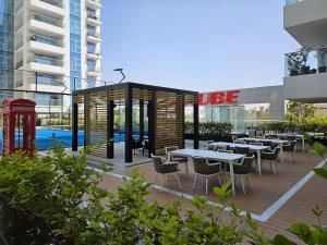 Vogue Vacation Homes, Al Furjan Pearlz by Danube near Ibn Battuta Mall, One Bedroom Apartment with Balcony and Pool View, Access toAmenities, Walkable to Al Furjan Metro Station