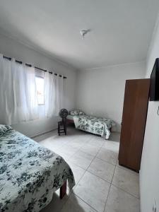 Casa luz e conforto Passos Capitólio