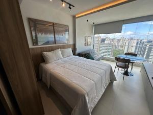 Studio c varanda em prédio c piscina URB1406