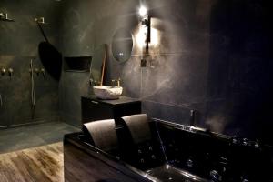 La suite des Arcades Grand place Sauna et Balneo