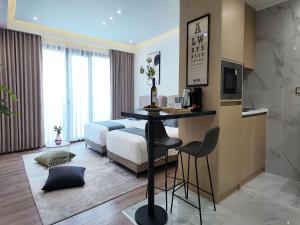 Coastal Apartment with On-Site Bar & Fitness