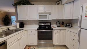 Spacious 4BR • Beach Right Across the Street • First-Floor • Community Pool Elevator • Ocean Pointe A2