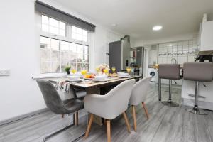 Spacious 4BR House By Homesy Short Lets & Serviced Accommodation Cardiff With Free Parking & WiFi