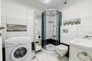 Stary Browar Deluxe Apartment by BookingHost