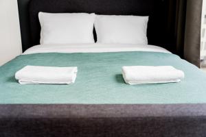 Stary Browar Deluxe Apartment by BookingHost