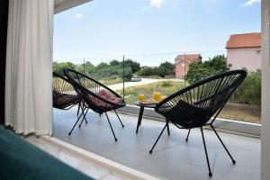 Apartments with heated rooftop pool, Bibinje