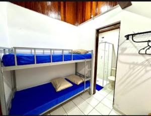 Casa na praia em condomínio com piscina e ar-condicionado