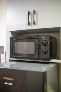 Cozy 1BR Balcony with Pool View Plus Free Parking