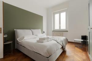 GuestHost - Morazzone Bright and Cozy Design Flat