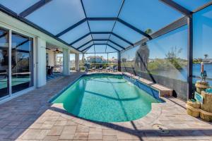 CoralVilla Sunset Cove - ping pong table, kayaks, pool, view, on water, boating