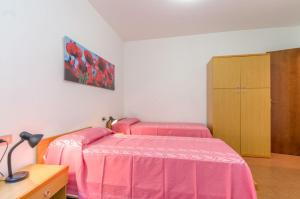 Terraced house with garden and pools