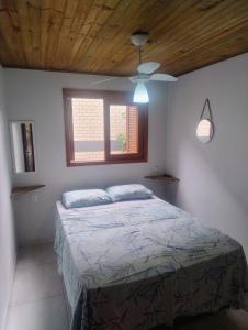 Quarto no centro praia do rosa