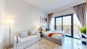Vacationer Holiday Homes l Modern Studio l Community Views l Free Gym, Pool