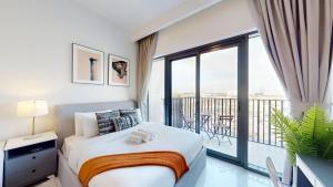 Vacationer Holiday Homes l Modern Studio l Community Views l Free Gym, Pool