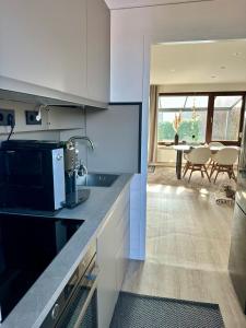 Bungalow kleine Deichperle, Strand, Deich und ein wunderschöner kleiner Ort in unmittelbarer, fußläufger Nähe!