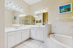 Dog-friendly lakefront condo with pools, hot tub, gym, game room & beach access