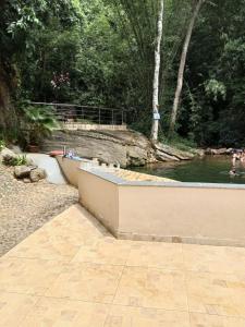 Casa em condomínio de Alto Padrão com Praia Particular, Piscinas, Cachoeira e Área Gourmet
