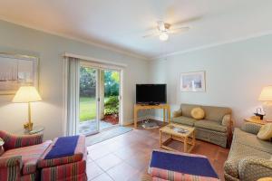 Condo with central AC, washerdryer, shared outdoor pool, & on-site golf